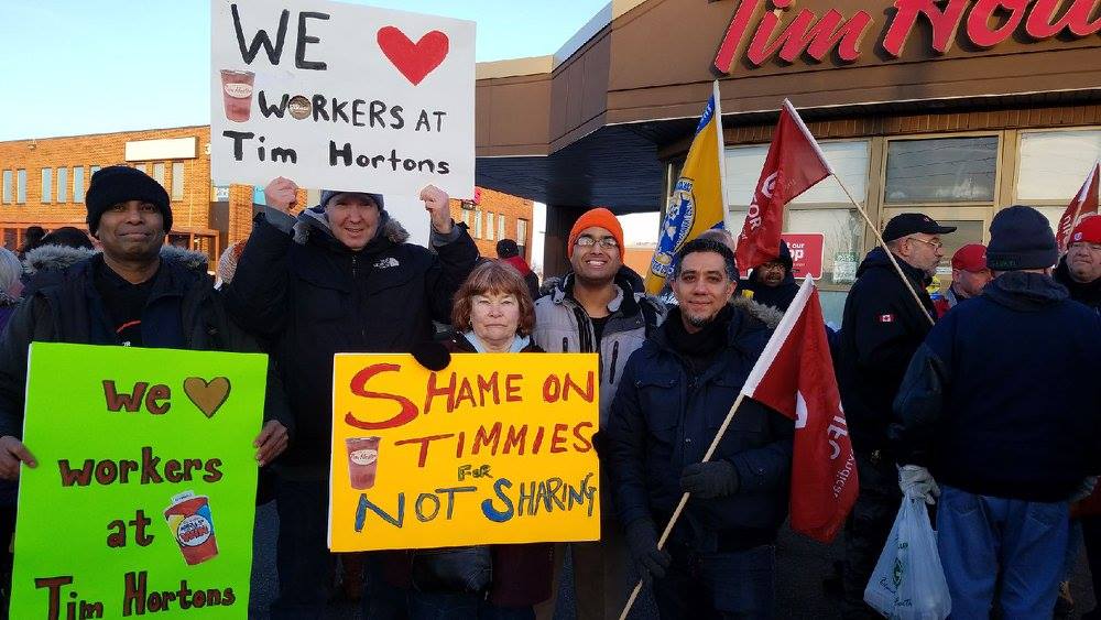 leadnowca's tweet photo. 50 actions across Canada today! #TimHortons made $3 billion in 2016 and CEO Daniel Schwartz pocketed over $6 million. @TimHortons: we know you have enough power and cash to protect workers and we won't stop until you do #IStandwithTimHortonsWorkers #DonutsNotCuts 🍩 https://t.co/fOYxs1VHj0