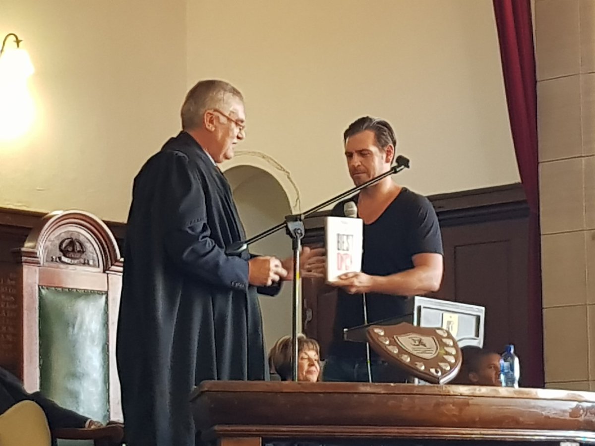 KingEdVIISchool's tweet photo. #RedOldBoy @KingEdVIISchool OB @mikesharman hands over a copy of his book ' The Best Dick' to the School Library #greatlifelessons given! Thanks Mike👏🏻💪 https://t.co/TDXA8soGdH