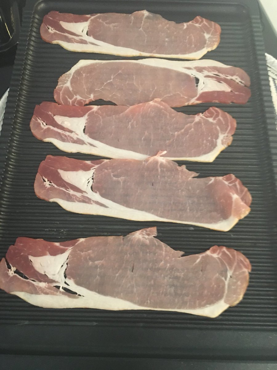 ZakoPenny's tweet photo. It’s #fryday time for a #baconbutty #crispybacon cooked on the #cast aluminium #floorgrid @AGACookshop @AGA_Official #comfortfood https://t.co/aB71Fsst9k