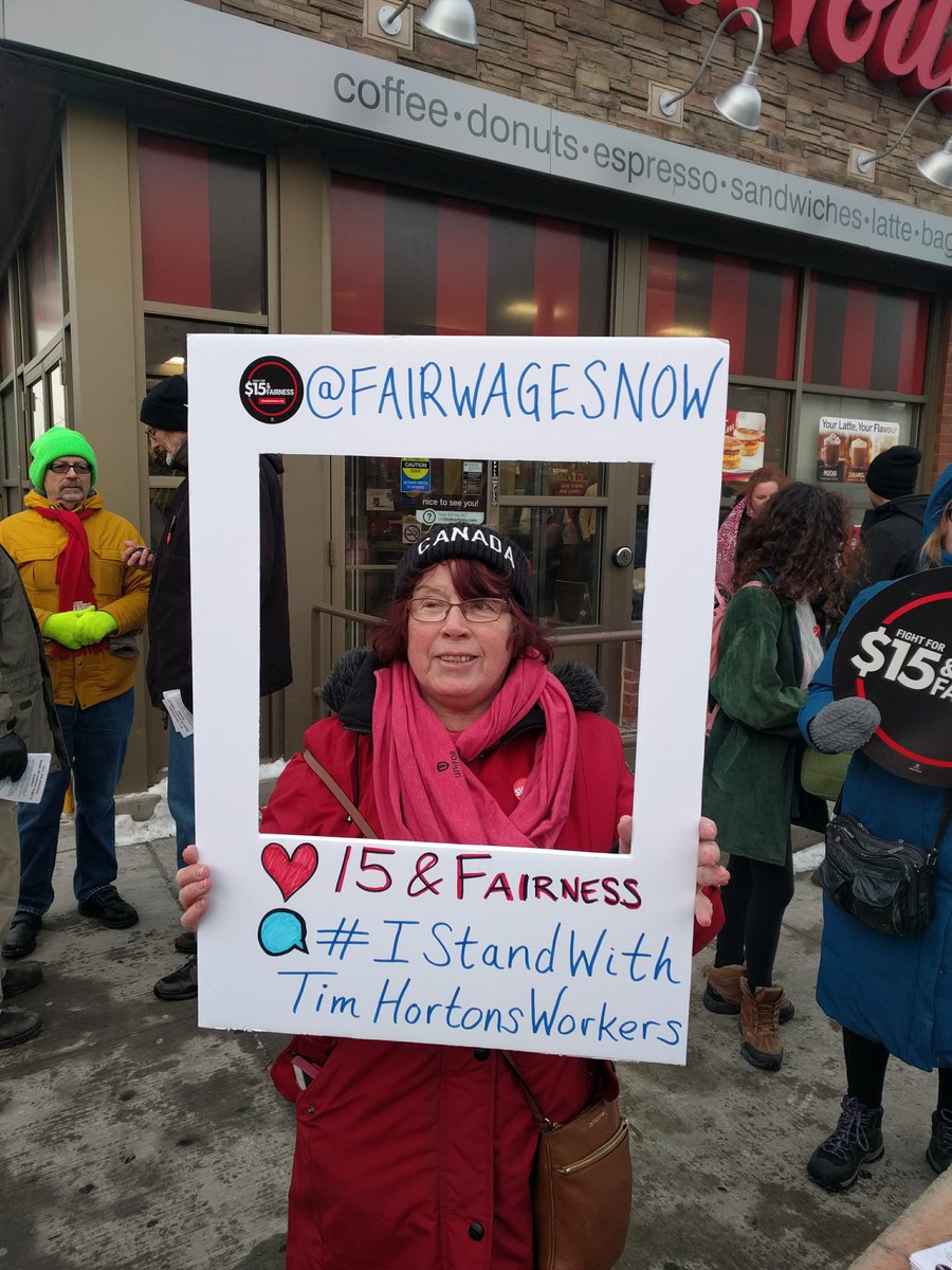 fairwagesnow's tweet photo. The first of 50+ Canada-wide actions happening today just kicked off, to find an action near you visit: https://t.co/xYpCq0DdN9 Let's send a clear message to the corporation, workers at @TimHortons deserve better! #IStandWithTimHortonsWorkers #15andFairness #DonutsNotCuts https://t.co/bpKhGWwxI0