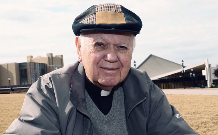 Albert Bischoff, S.J., (Father B.) in front of Bellarmine Chapel