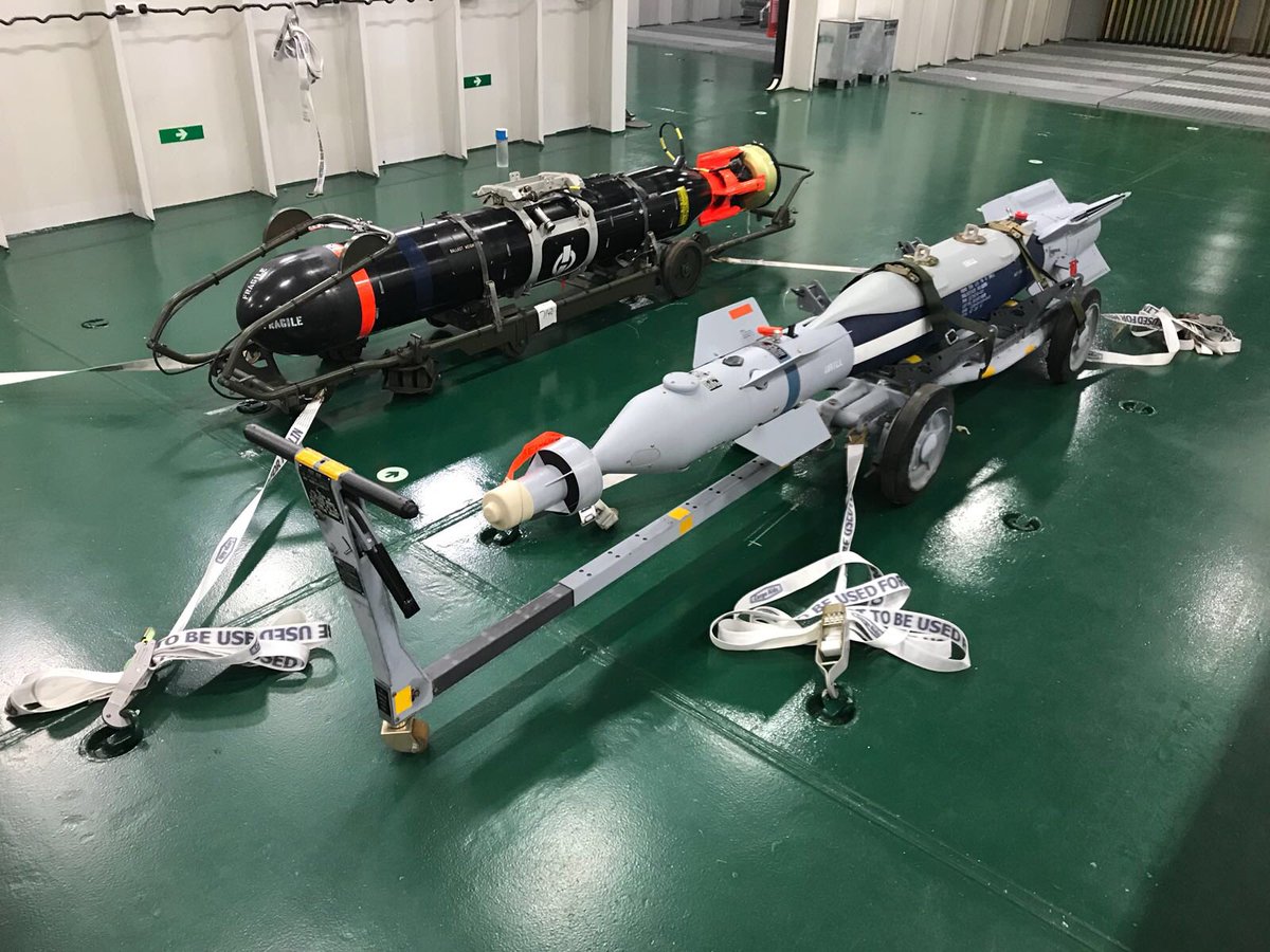 Two different types of air weapon assembled and lashed to deck.