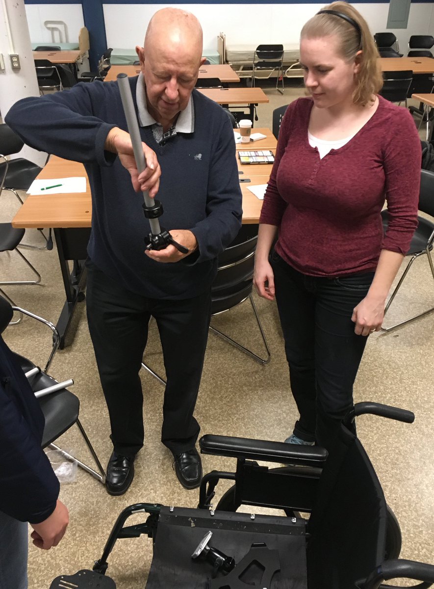 It's a practical, hands-on day for the #UBCMOT students. Here's Marie-Louise being shown how to attach Rehadapt Mounting Systems to a wheelchair thanks to Dave Joseph