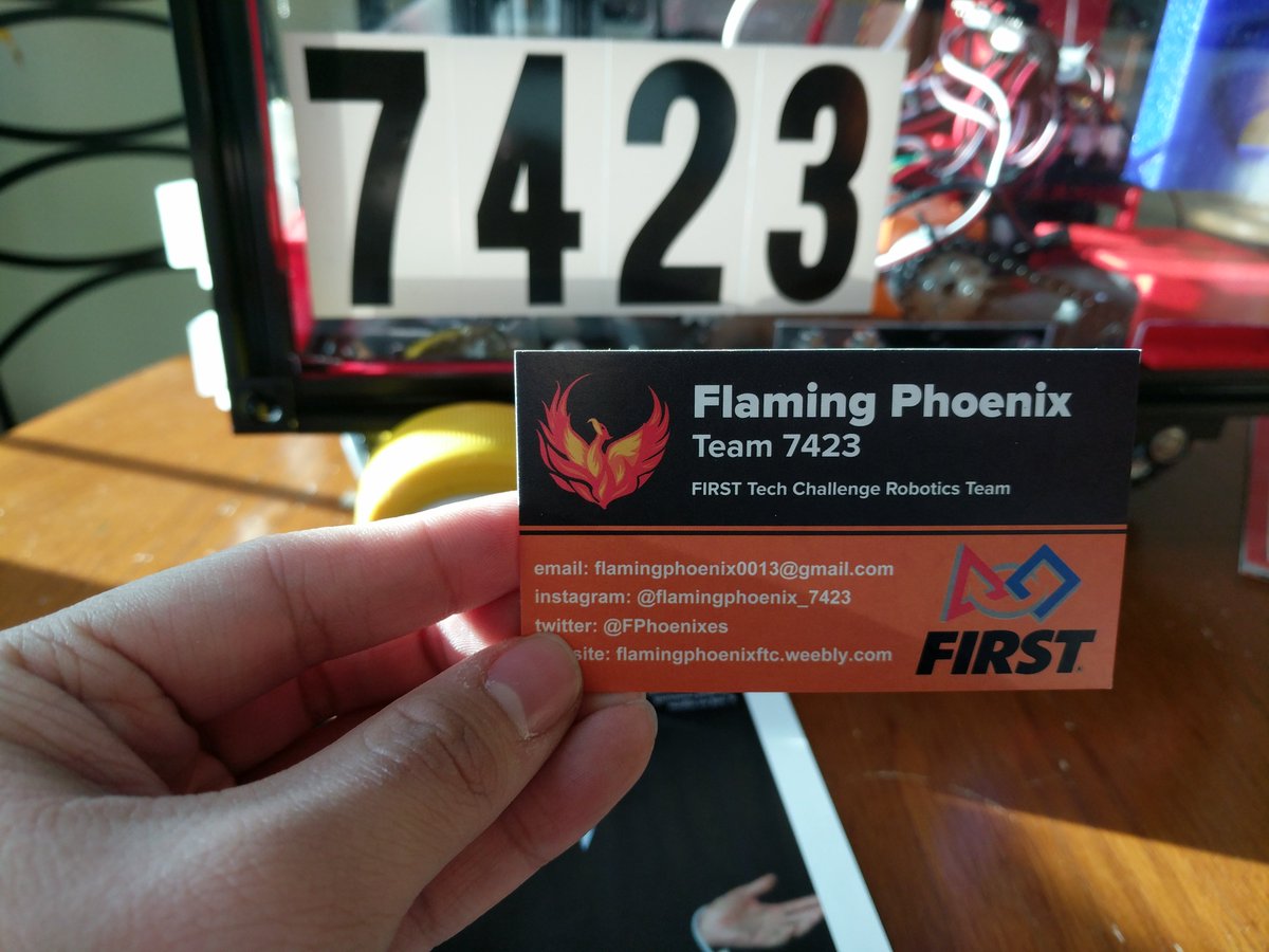 Our new business card! and a sneak peek of our robot 😉