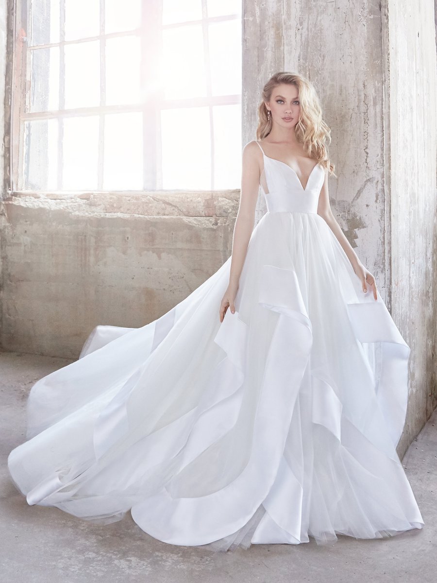 Her name is "Andi," and she comes from the amazing <a href="/misshayleypaige/">Hayley Paige</a> . #PWGbrides #weddingplanning