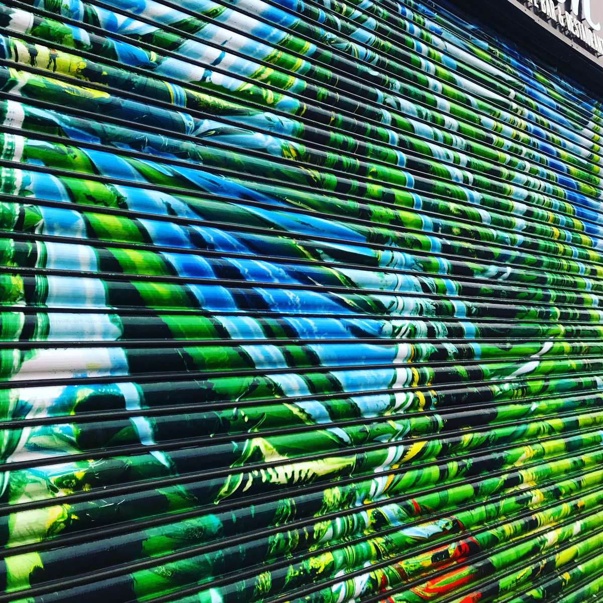 TeamCatford's tweet image. Bit of totally tropical Catford from @artmongers #shopshutter #CatfordStyle