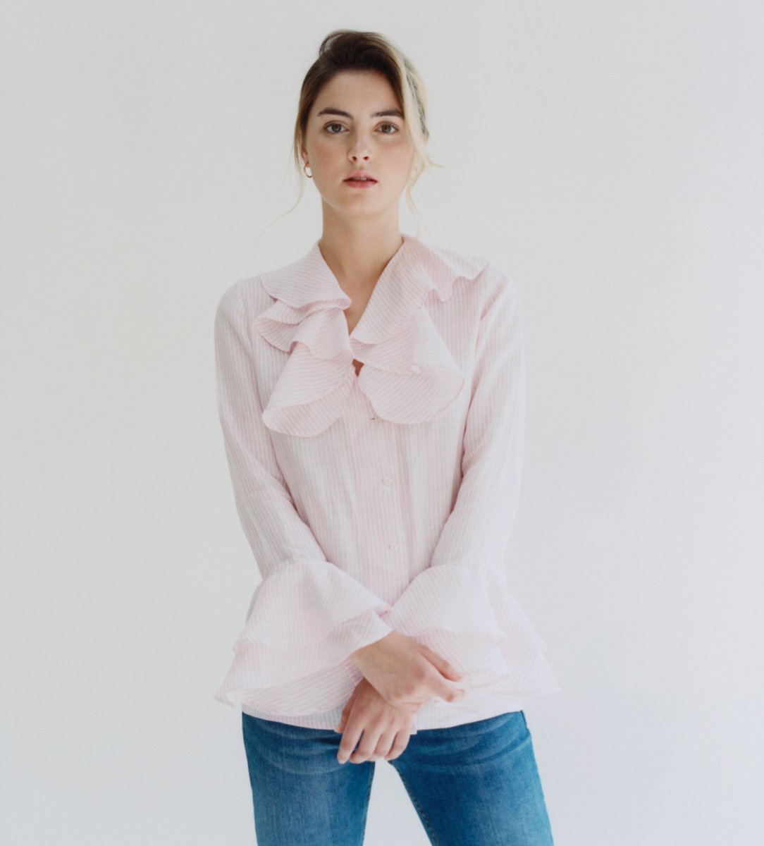 This romantic look with cascading ruffles around the collar and cuffs creates the most feminine #shirt