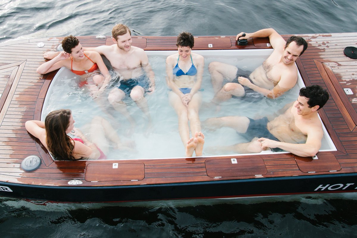 BUTCHBLUM's tweet photo. #RewardoftheWeek: @HotTubBoats is located on South Lake Union, merged classic wooden boat design with radical concepts creating a truly one of a kind vessel. Offers comfort, relaxation, and revolving scenery, all while soaking in 102 degree water! https://t.co/gyFzZ9NhiN
