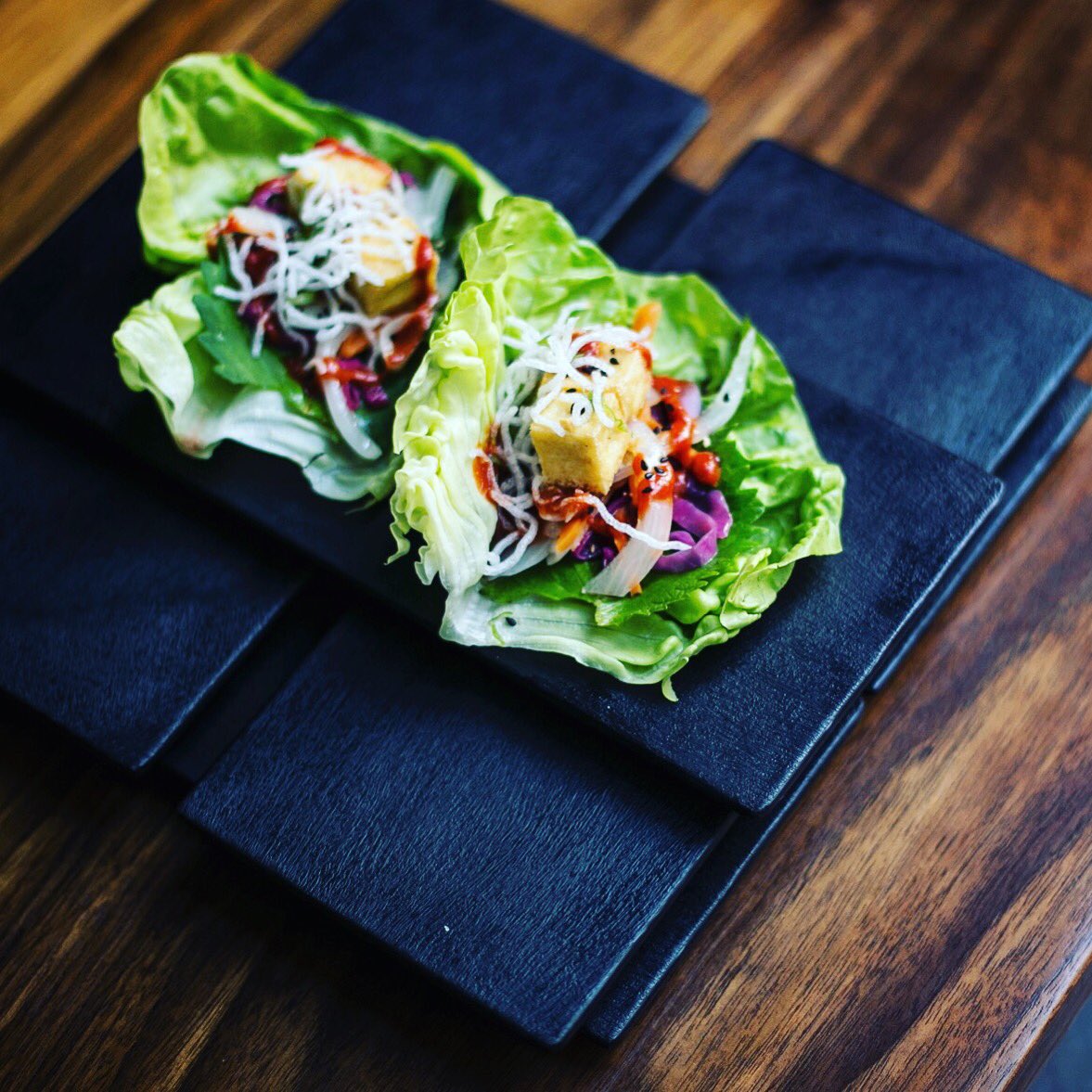 Have you tried our #shisolettucewrap 😎🙌🏻 | Sautéed vegetable, shiso, gochujang, fried tofu, vermicelli | #mirasushinyc #vegetables #tofu #shiso #wrap #nyc #flatiron