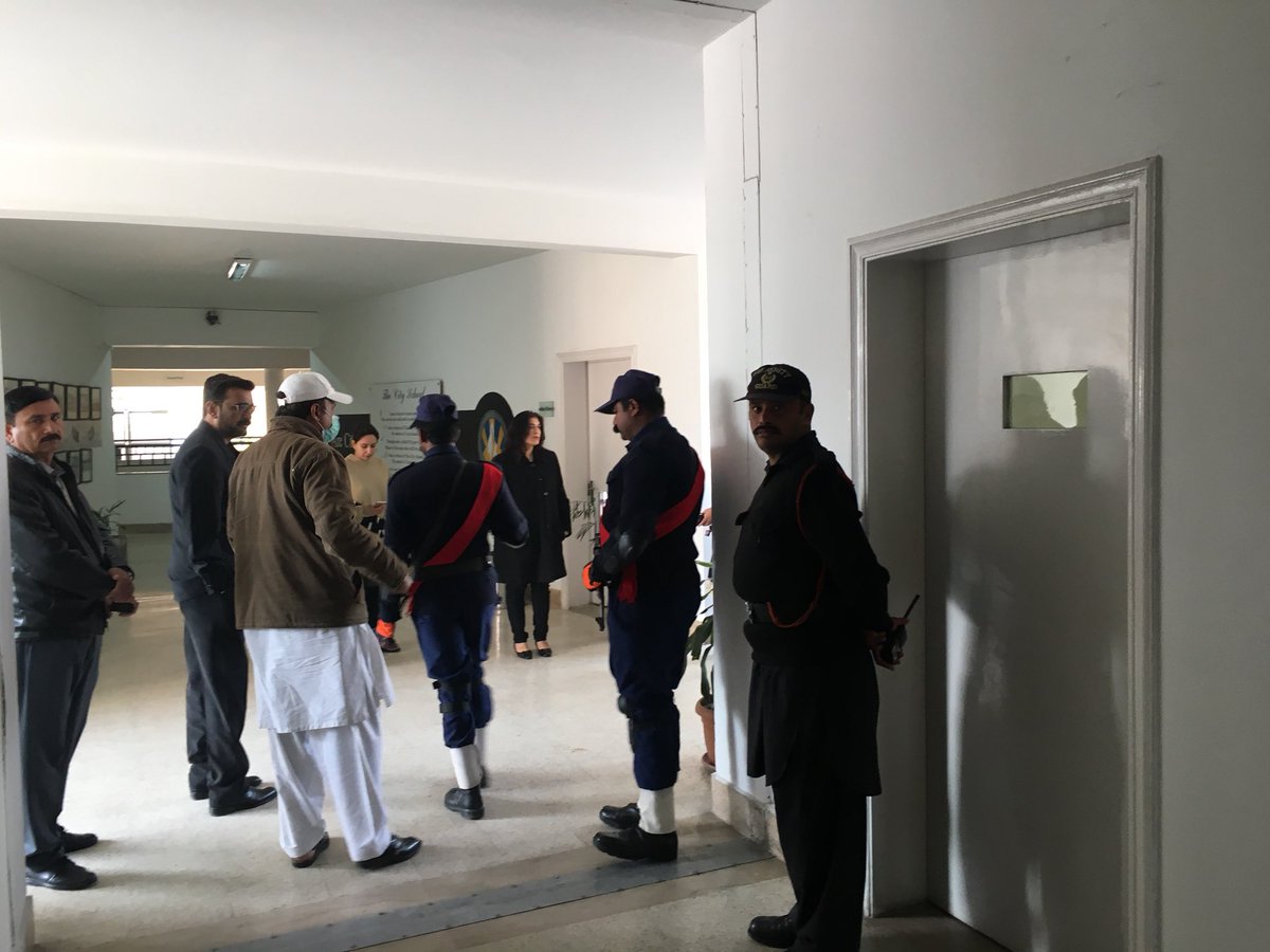 hammad52's tweet photo. Two Armed Guards placed at the door 🚪 of the Room in which all Parents were kept at TSC Ravi Campus, Johar Town, Lahore. https://t.co/6kHrBTXmsr