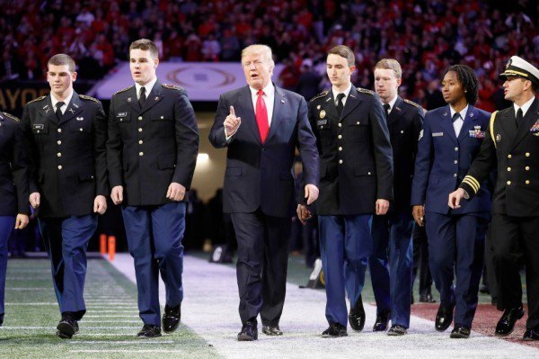 SheriffClarke's tweet photo. .@realDonaldTrump appearance at Bama, Georgia college football National Championship game for the playing of the National Anthem was ALL AMERICAN! CROWD WENT WILD in approval. https://t.co/N0HkAs3IZU