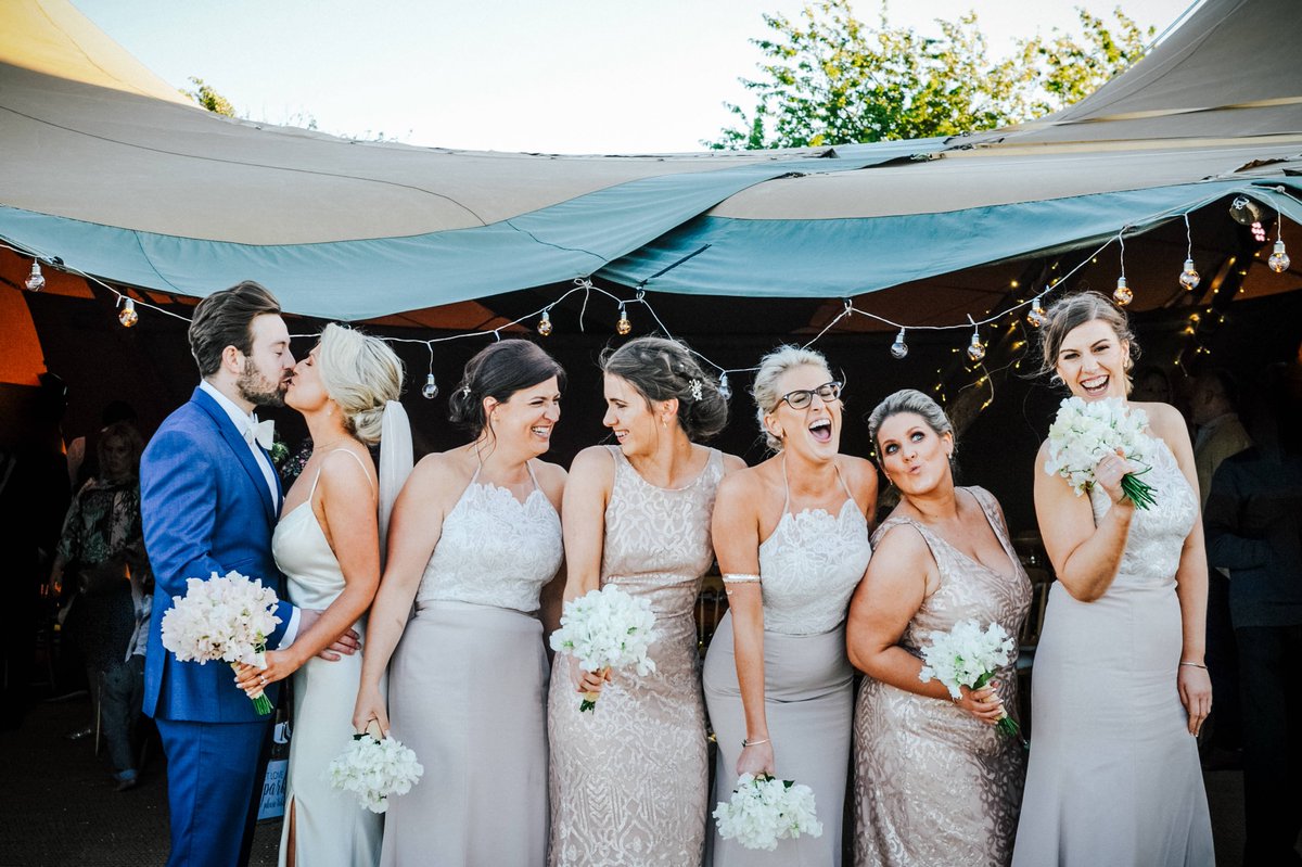 SugarbirdPhoto's tweet photo. When your mates catch you having a cheeky kiss! @3Acres  @TotallyTipi #yorkshireweddings #tipiweddings #leedsweddingphotographer #dreamweddings https://t.co/fGCuixMfvI