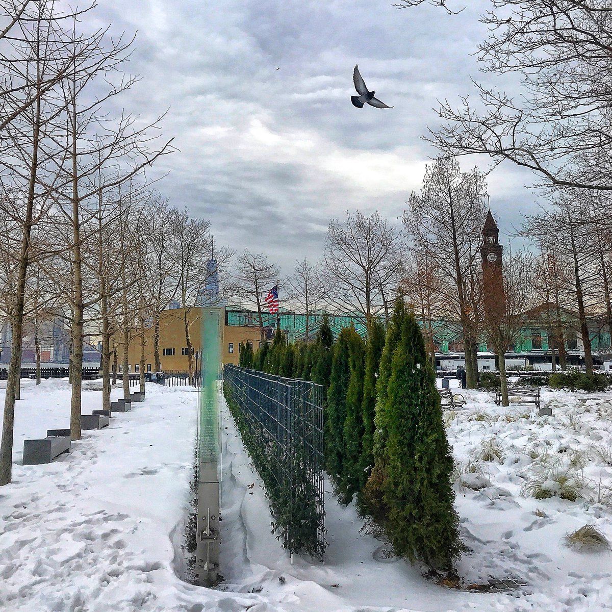 dontsithome's tweet image. On 9/11/17, the @CityofHoboken revealed a beautiful memorial for the 56 Hoboken residents who were lost on 9/11. With the fallen leaves, you can see perfectly how the design has the 56 glass panels directly in line with Ground Zero. 🇺🇸 #NeverForget #Hoboken #PierA