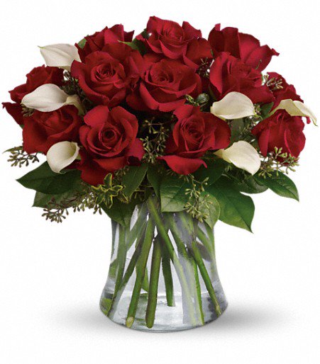 #BeStillMyHeart is a gorgeous floral design by #MayfieldFlorist It features a romantic array of #RedRoses and fragrant #WhiteCallas. All beautifully presented in a sparkling glass vase. These gorgeous flowers will leave a lasting impression. #WilliamsFlowers #TacomaWA