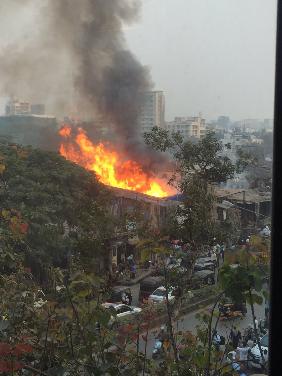 VanzzzB's tweet photo. @ANI @ReutersIndia Fire on Andheri SV road near subway and very close to railway tracks. No fire brigade vehicle showed up in the past 20min https://t.co/yHFn5qTcaF