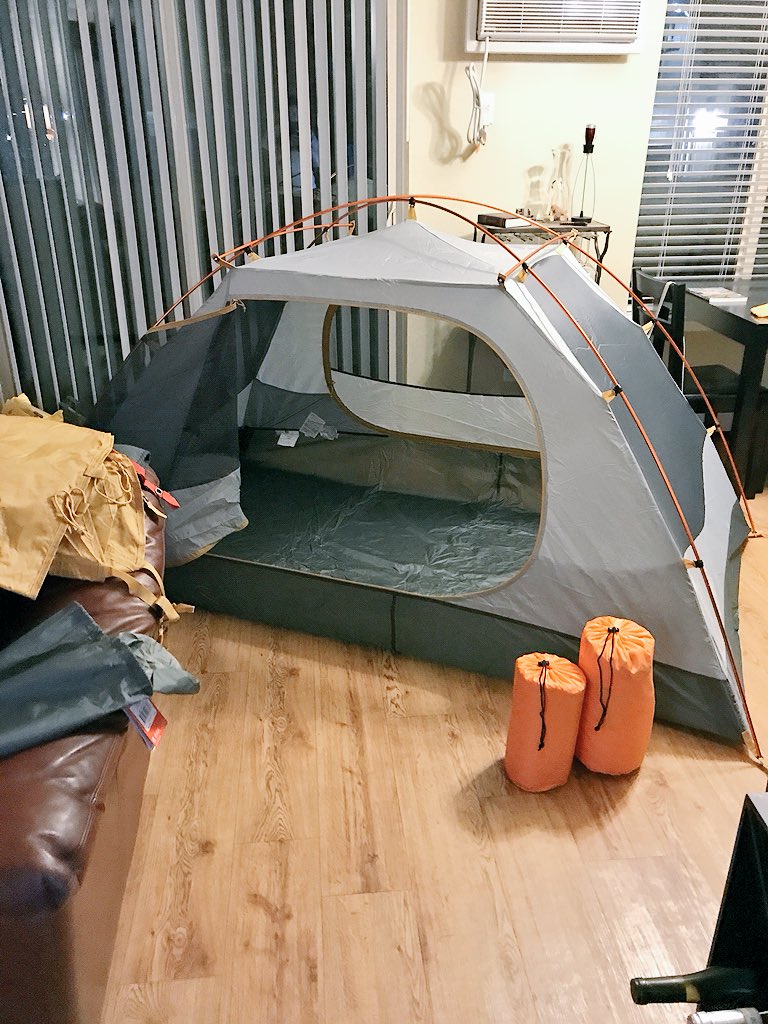 carlyalambert's tweet photo. We’re planning a backpacking trip in Canada for June, and already messing around with our gear in the living room. @zblambert https://t.co/EYt4HCb9EV