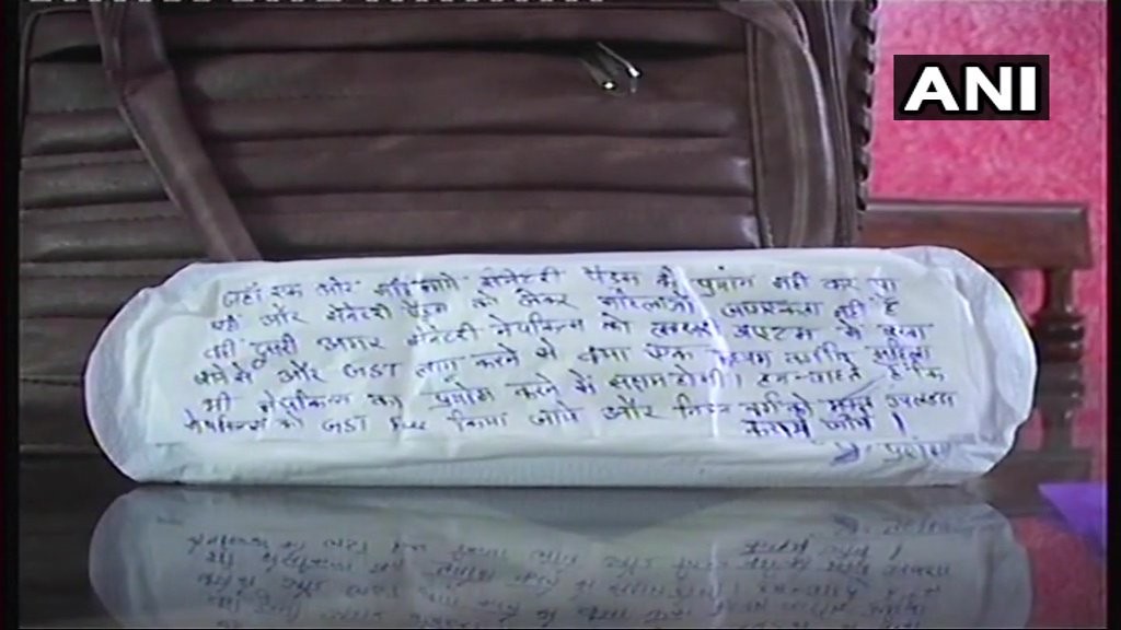 1000 sanitary napkins with messages on menstrual hygiene written on