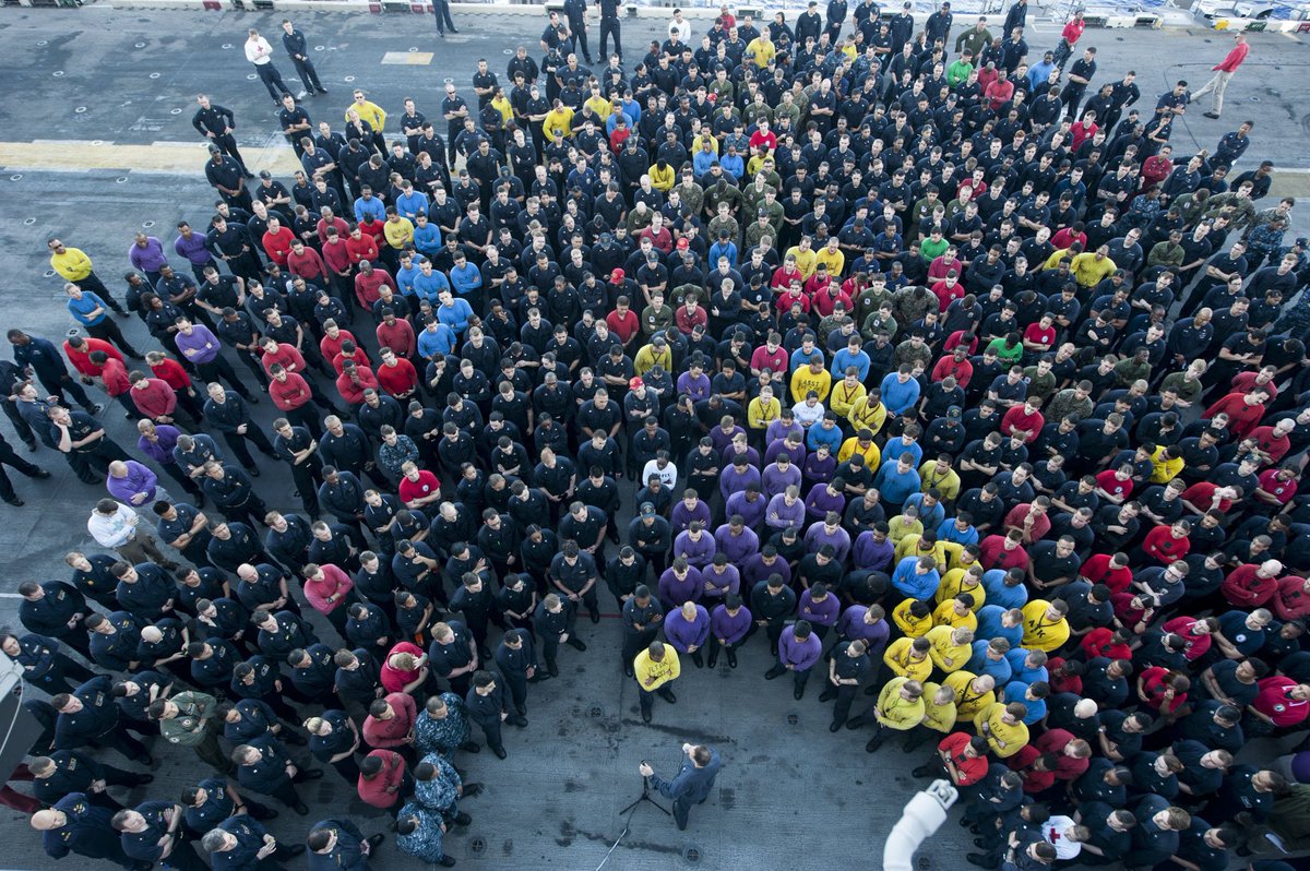 jodi_mohrmann's tweet photo. A unique photo as #USSAmerica's commanding officer addresses the crew on the flight deck. The #AmphibiousAssaultShip is part of the #AMAARG w/ embarked @15thMEUOfficial, operating in the Indo-Asia-Pacific region &amp; serving as a ready-response force @USPacificFleet @USNavy @USMC https://t.co/SDsosCl1kV