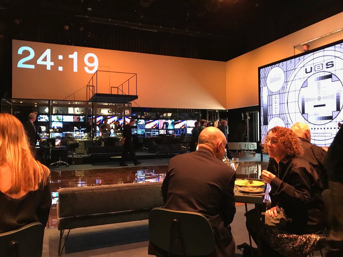 JoshuaRozenberg's tweet image. View from my seat on the stage of @NationalTheatre as audience arrives for #NTNetwork and gallery counts down to start of the show. Fortunately, we are not allowed to tweet once it starts.