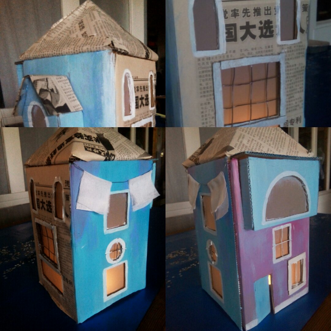 This type of cardboard house. With embroidered textile to simulate the island bit?