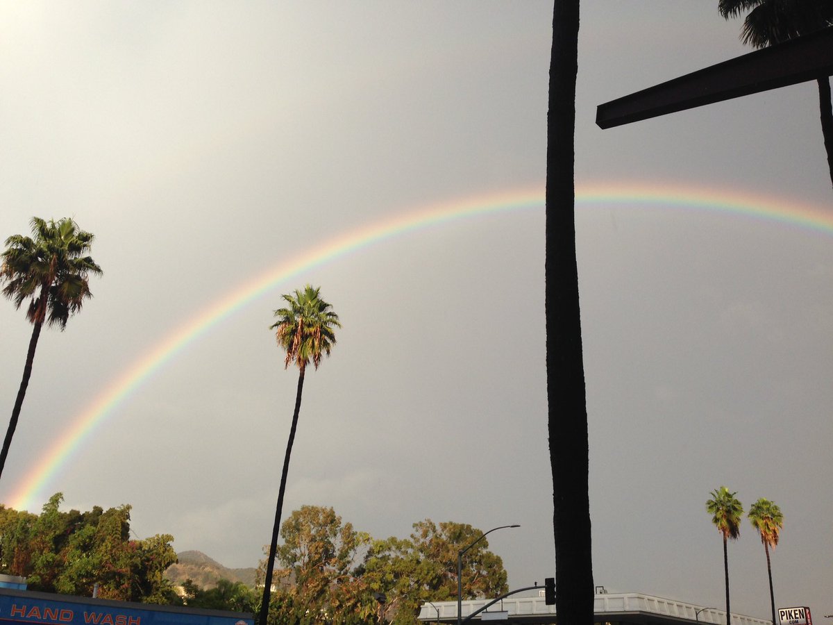My view while having a slice of #pizza #rainbow #love