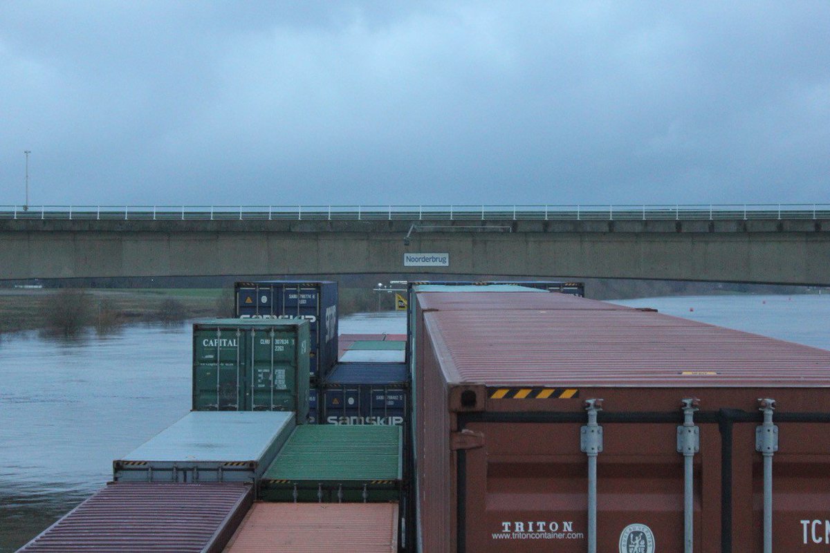 High water on the Maas. Shipper of MS Arese, from Hutchison Ports Venlo on its way to Hutchison Ports ECT Rotterdam, uses every available inch. Pure craftsmanship.