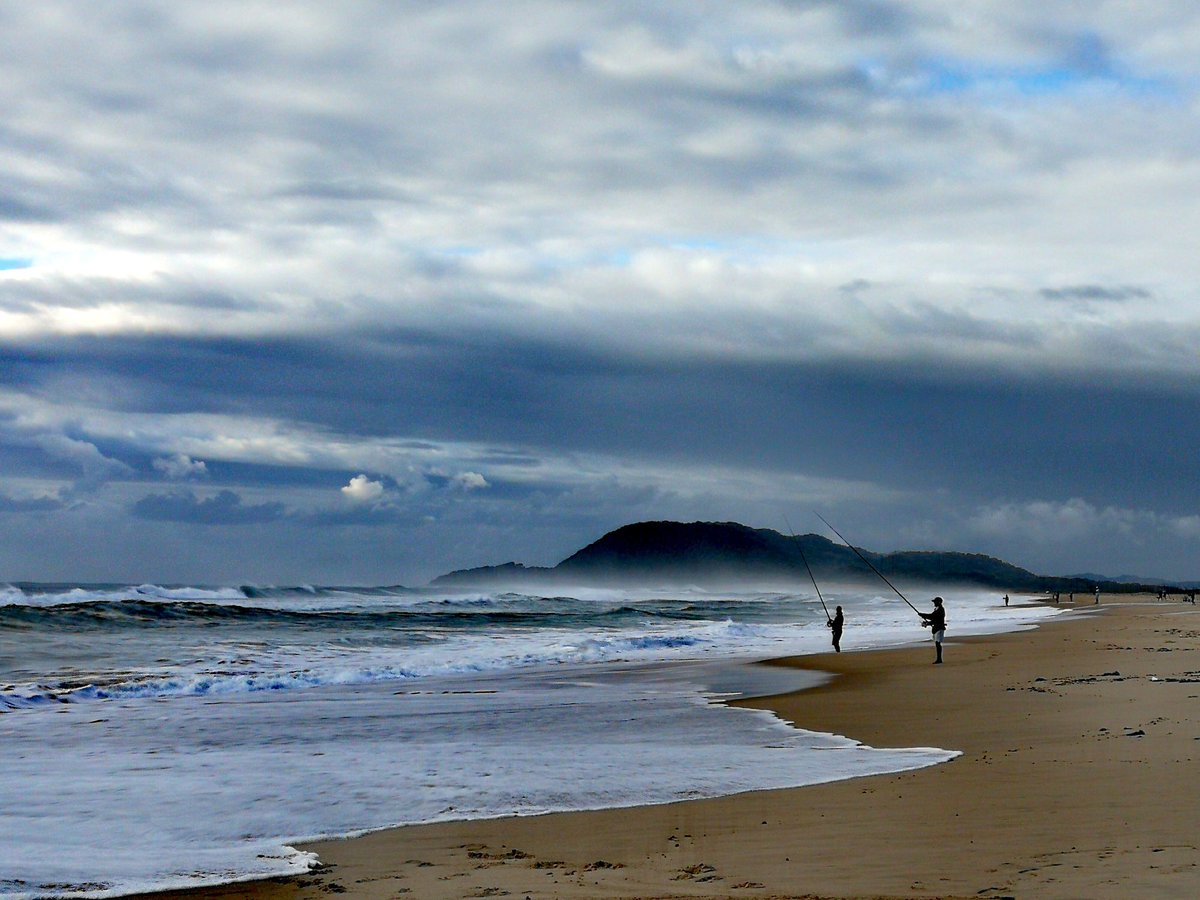 iSimangalisoZA's tweet photo. Under rainwashed skies, fishermen try their luck at #StLucia and #Maphelane in #iSimangaliso https://t.co/x9MutueDMR