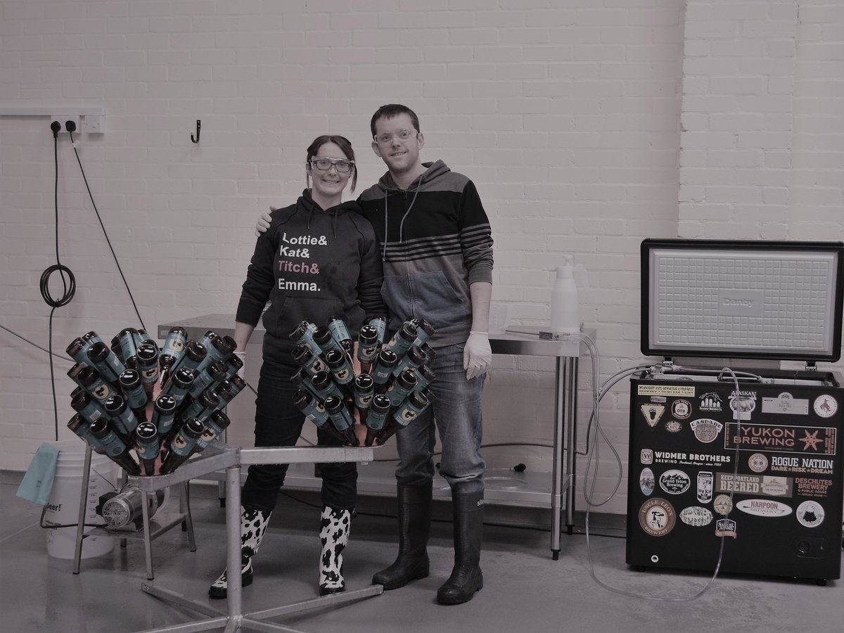 Tryanuary's tweet photo. This was Emma and I doing the first ever 'commercial' bottling run using a @BlichBeerGeek #beergun. It was slow and took us well over a week to carbonate and fill about 300-400 bottles. We can do that now in about 15 minutes! - Dave #Tryanuary https://t.co/dn1qwomfdr