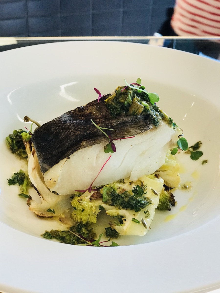Roast cod served with food hero cauliflower, water cress and caper dressing