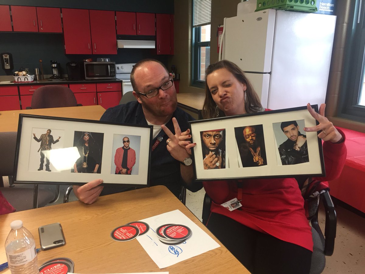 dogeared_lib's tweet photo. Teacher fun in the lunch room today after playing some much needed music trivia to lift our spirits! Look at our gangsta prizes from the lovely @bgambro! Can’t wait to put it on my  wall! Holla!!! #livinginaganstaparadise https://t.co/a5Grvs9QAk
