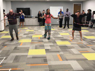 RockiHowardSPHR's tweet photo. Happy New Year. First #JAXGSC #WellnessWednesday of 2018. Hula Hoop relay and hopscotch. YEAHOO! @RSOutsourcing #work4RS https://t.co/woNMCZqd8K