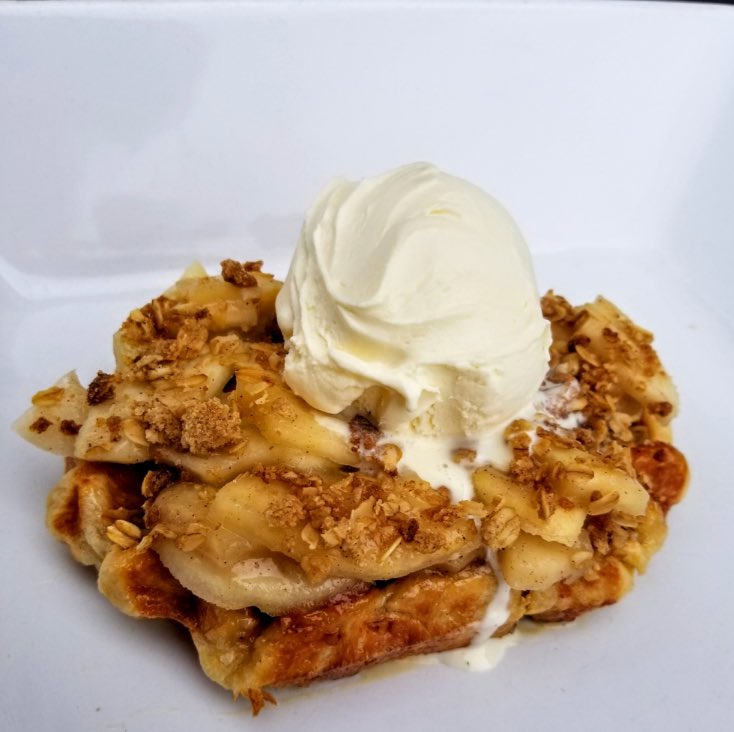 Introducing the APPLE PIE WAFFLE 😵🍎🍰💯Warm Caramel apple Pie filling served with a crispy topping and a dreamy scoop of vanilla ice cream.