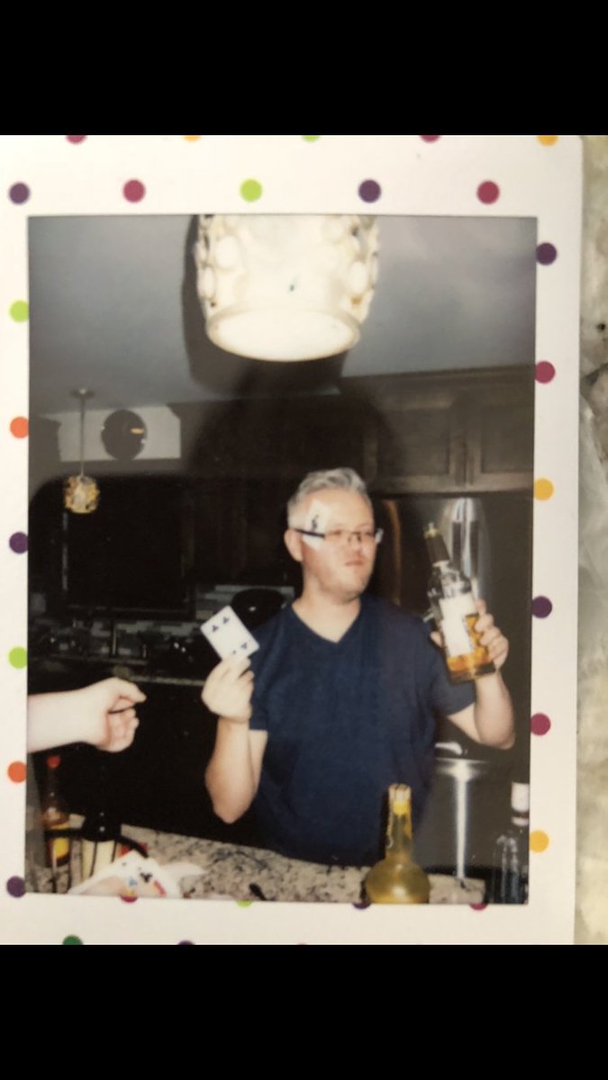 scribbled in sharpie on the polaroid:

DONT TRVST THIS MAN