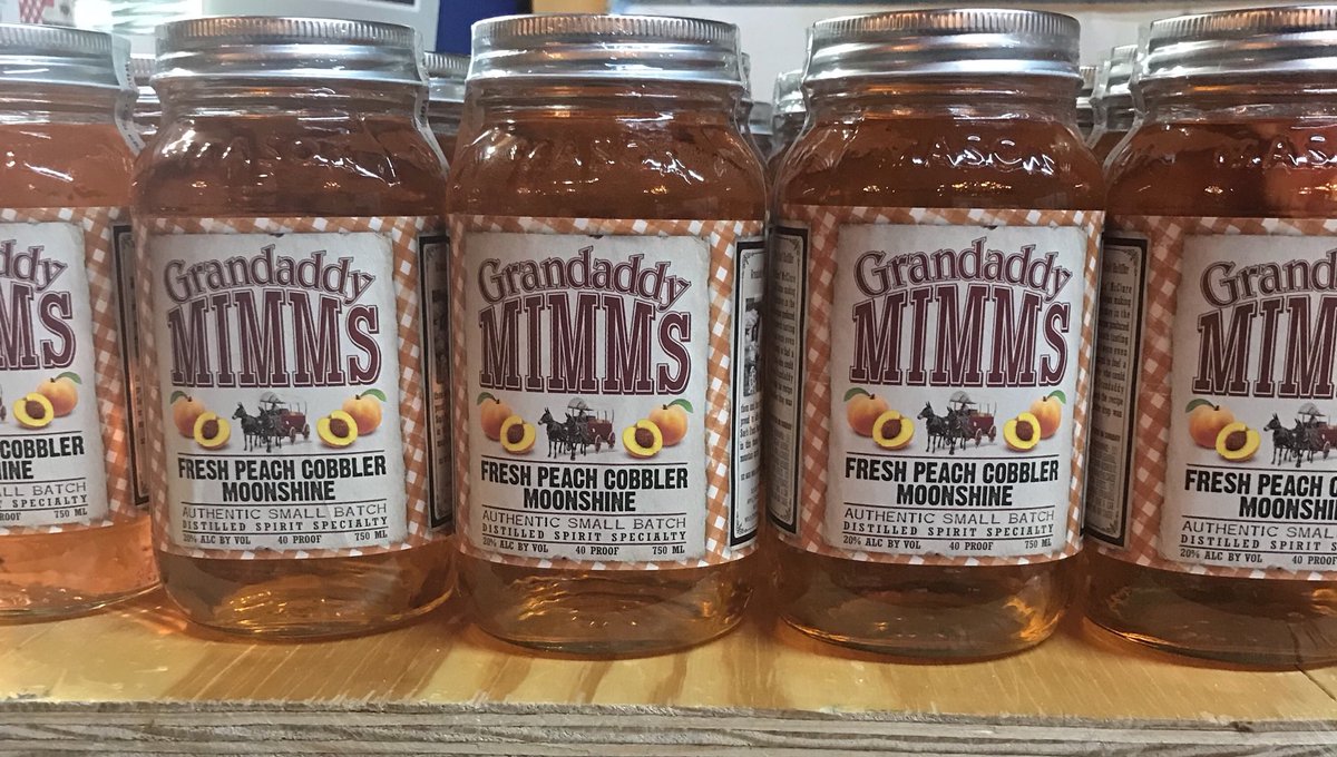 GrandaddyMimms's tweet photo. Just got through bottling some good ole Peach Cobbler Moonshine. All of our flavors are 100% natural and made with 100% Shine distilled right here folks.  COME TASTE THE DIFFERENCE! #Moonshiners #smallbatch #blairsvillega https://t.co/RZ2sry3N1T