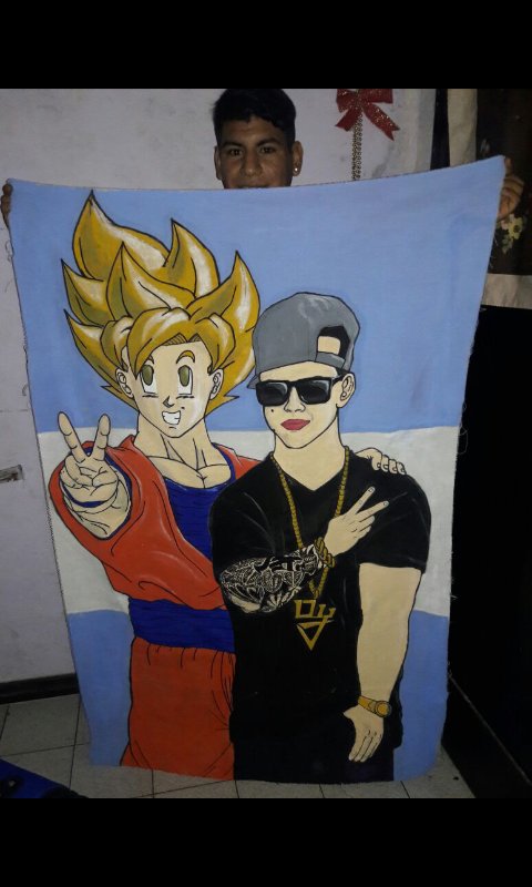 danny_dymfc's tweet photo. #DaddyOzunaEnLOS40 quisiera ganar la entrada par ir al show para que @daddy_yankee llegue a ver mi bandera que hice de él y Goku!! @Los40ar https://t.co/YSKkYOpDg9
