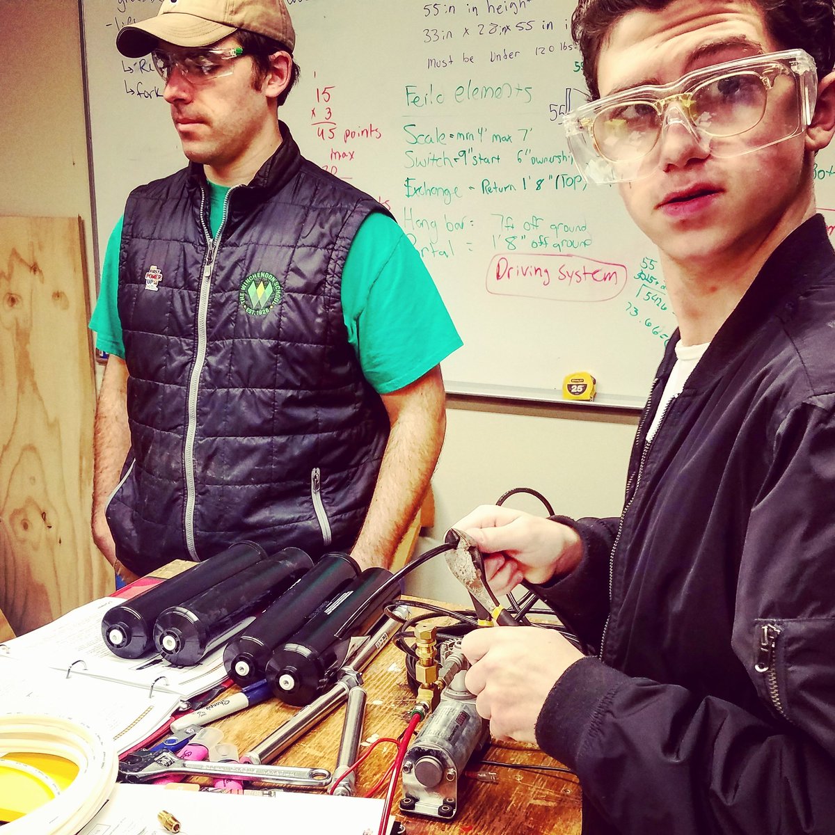 FRC5491's tweet photo. #FIRSTPOWERUP #buildseason day 2: Izaak attempts a prototype build of pneumatic components before he and Emma head to Houston for post-hurricane disaster recovery work with #thewinchendonschool #HoustonColLAB -- #ThisIsSchool and it's #morethanrobots. Safe travels! Do good! https://t.co/AtsI9hDt3N
