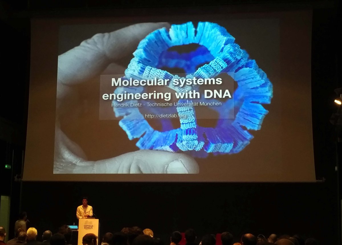 ChemBioChem's tweet photo. Great start into the second day of the NCCR Symposium on Chemical Biology #ChemBio2018 with the talk by @hendrik_dietz (@TU_Muenchen) on #DNA engineering. His recent Concept on #DNAorigami with @ChemBioChem is now #freetoread until the end of January. https://t.co/3LAgWH0yC9 https://t.co/6E5I4UqxHZ