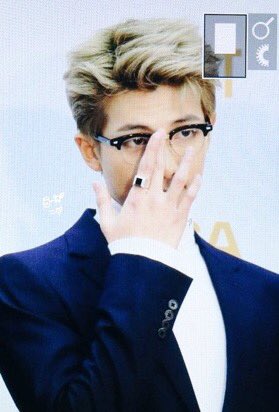 BTSbornfirst's tweet photo. I’m still not over how stunning Namjoon looked yesterday with those glasses and that sweater and I probably saved the same photo half a dozen times because you can never have too much Namjoon on your camera roll.

Vote @BTS_twt #BTS for #BestBoyBand in #iHeartAwards https://t.co/EuPp4dZl0d