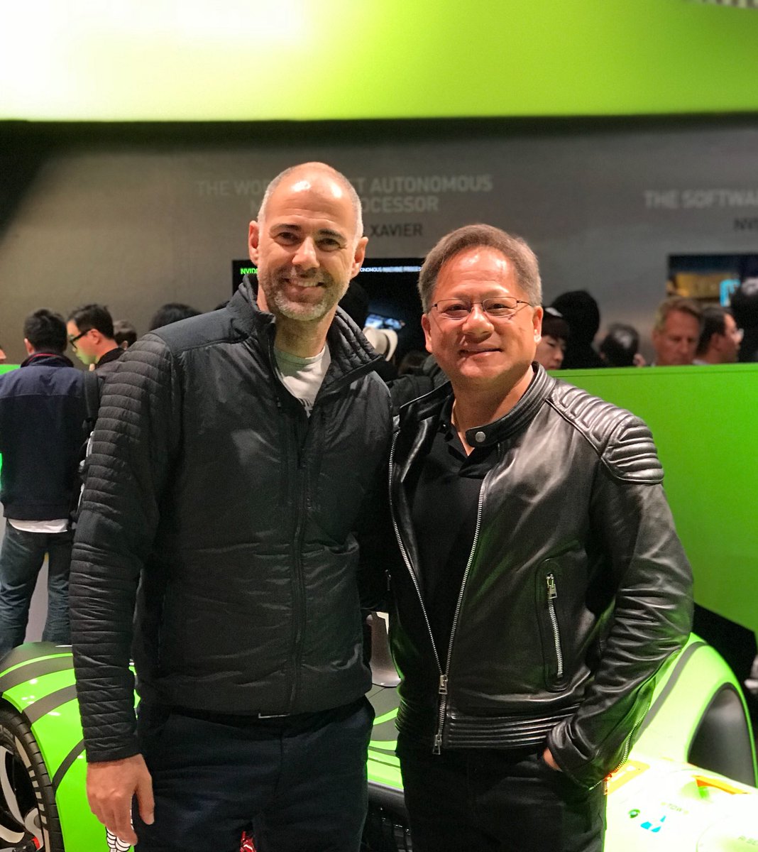 DanielSimonCom's tweet photo. With @FortuneMagazine business person of the year, @nvidia CEO #JensenHuang who is pushing boundaries towards a new era of AI. Their chips make our #robocar take it’s own decisions and learn. @roborace @nvidiadrive https://t.co/zOQxnWsPe0