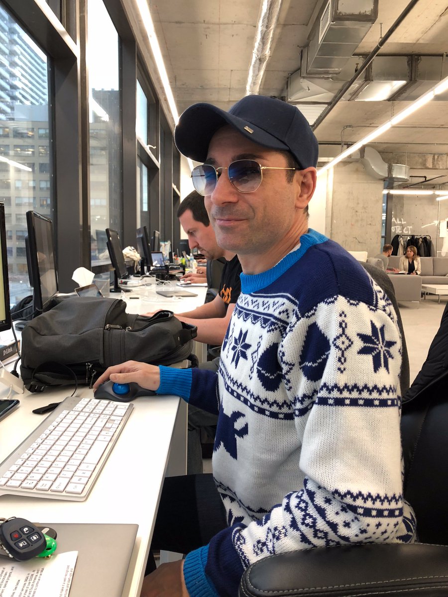 Staying warm and cozy in the #uglychristmassweater from @PolymathNetwork.  Thanks for the kickass gift.