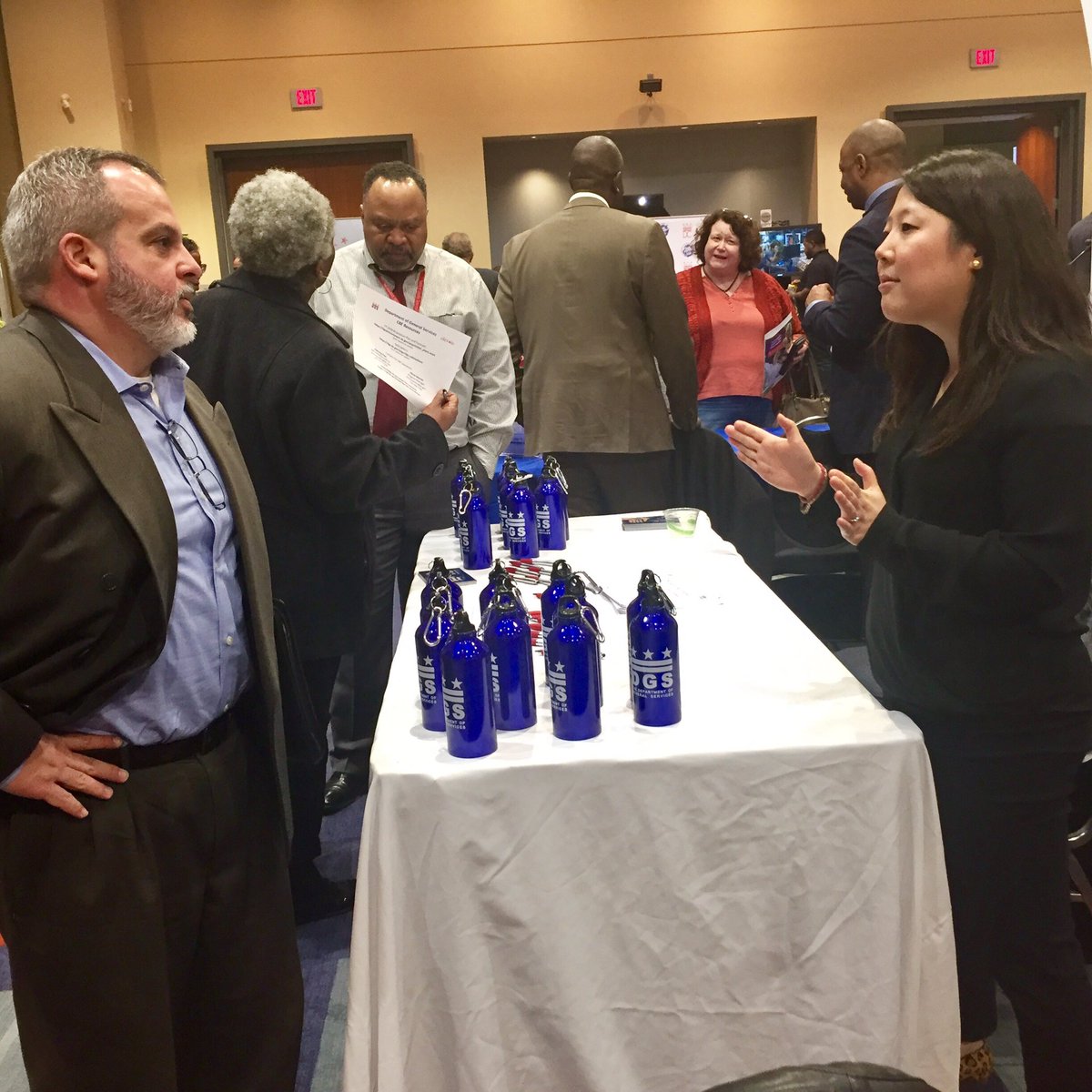 DCDGS's tweet photo. .@DCDGS certified business inclusion officer, Jiyoung Park engaging residents @DMPEDDC  open house!  @WeElevateDC @DGSprocurement @COSDGS https://t.co/uYNyuDArsd