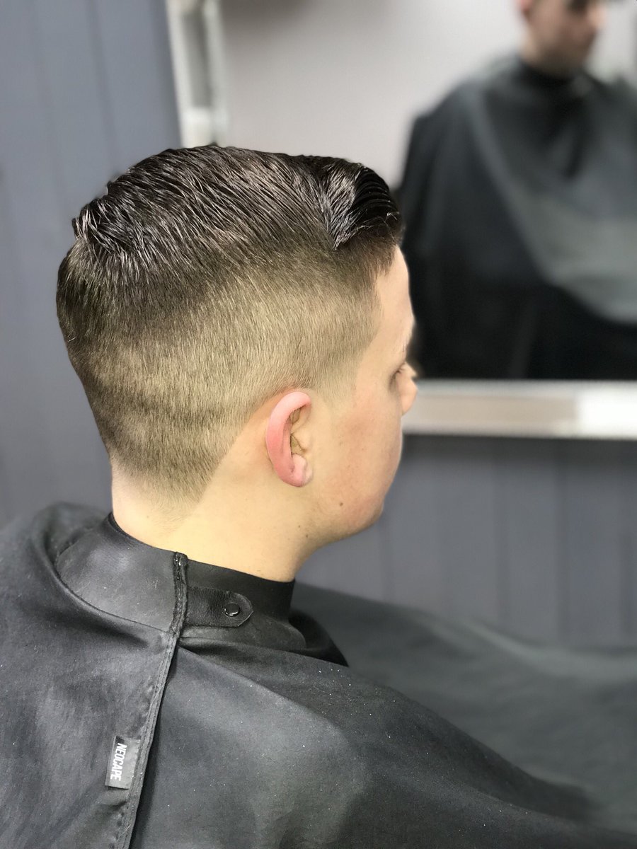 1.5 back and sides with a hard parting, Trim on top and tapered side burns and neck 💈🙌🏻
