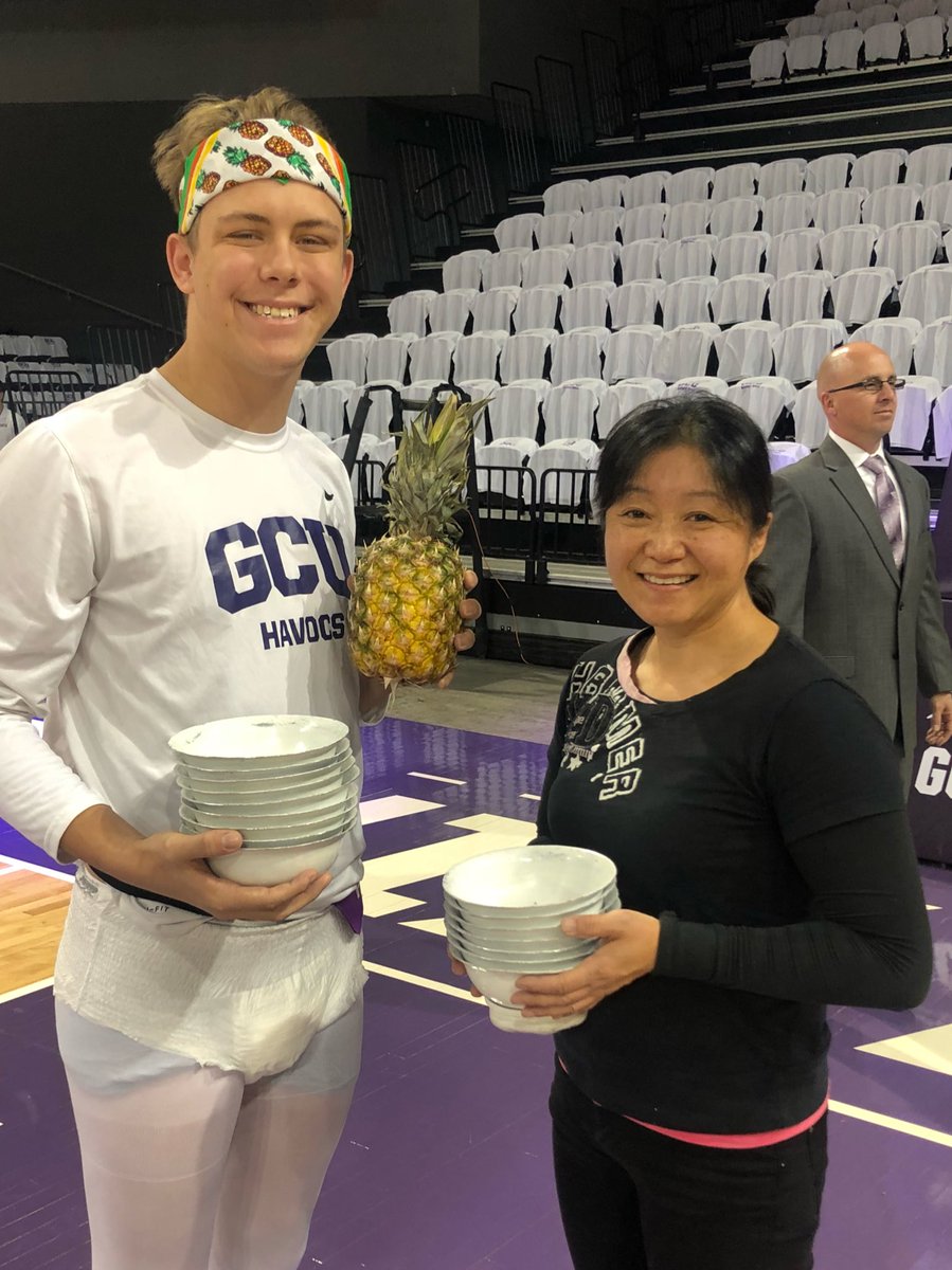 GCU_Lopes's tweet photo. Spotted @notthefakeSVP at @GCU_MBB game, where two of his favorites, Red Panda and ‘Gavin’ (#pineappleguy), are together under one roof. #LopesRising https://t.co/Ga41cxqYaw