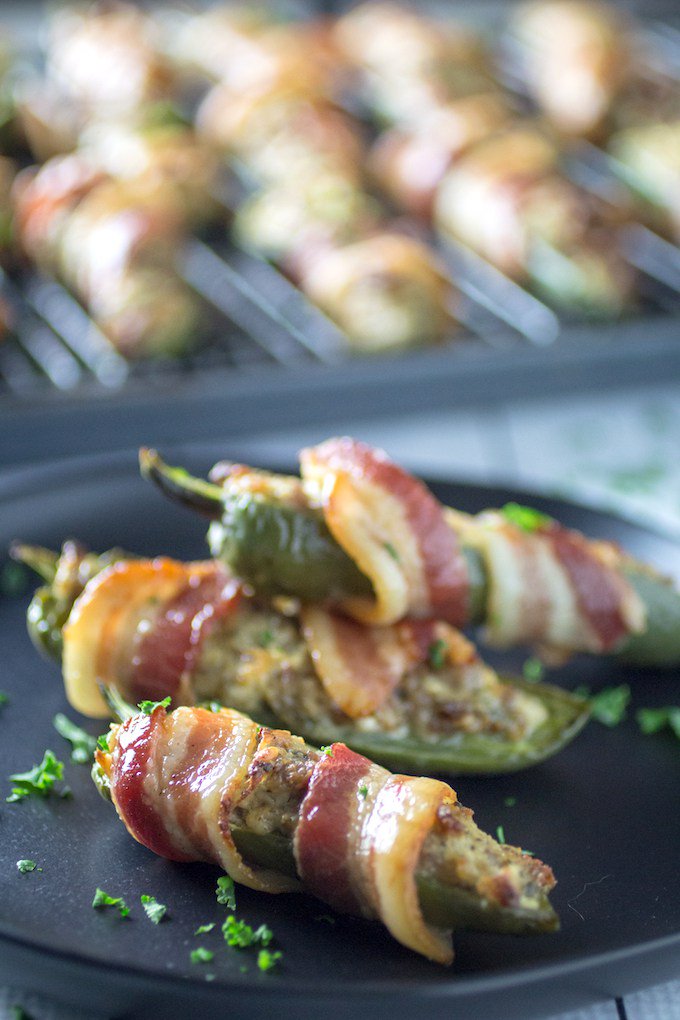 Bacon Wrapped Sausage Stuffed Jalapenos dishingdelish.com/bacon-wrapped-…