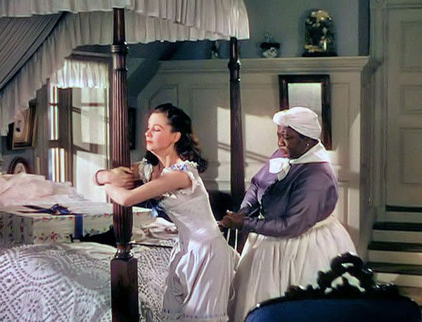 1  #UPMTC One of the most popular images today of the Victorian woman is of her being laced by a maid as she clings to the bedpost – the perfect representation of repression. I’m exploring how this trope was deliberately used to distance “modern” mores from the past!