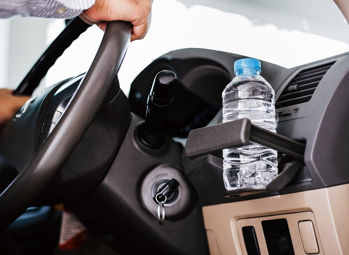 Hertz's tweet photo. Leave your drinks in the cupholder. According to @DecidetoDrive, 65% of near-miss crashes are caused by #DistractedDriving while eating or drinking. https://t.co/sG7EZySX9s