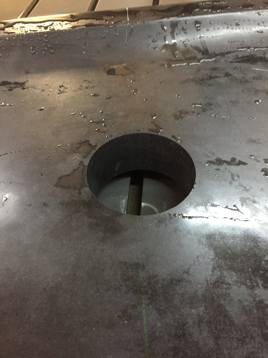 PercocoMarble's tweet photo. A few pics from yesterday machining a 3" &amp; 6" hole in a 5" thick Absolute Black granite fountain. -mm #granite #CNC #fountains #black https://t.co/6qcN4Q5LCs