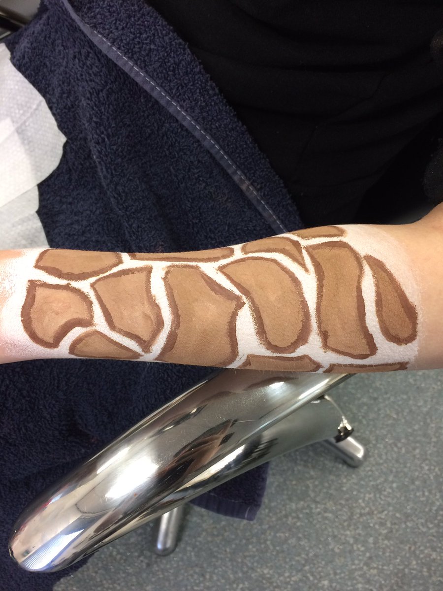 CFarrallMakeup's tweet photo. Giraffe face and body paint on my model Lauren's face, arm and leg using @Snazaroo face paints #giraffe #facepaint https://t.co/JtmEL8nBgj