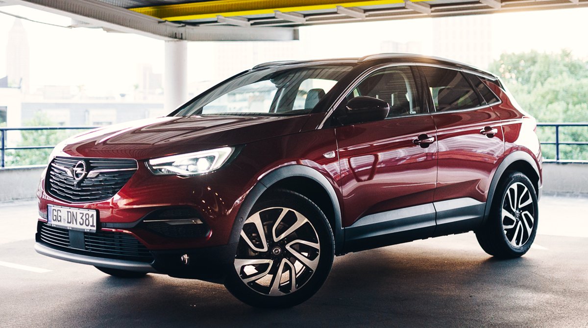 Opel's tweet photo. The #Grandland X has jaws dropping even in the parking lot. Are you all about that design life? https://t.co/lwzulgFFWd