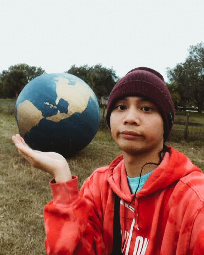 KevAmarillo's tweet photo. Petite Filipino boy holds the world...🌏 https://t.co/BykJFJGMnc